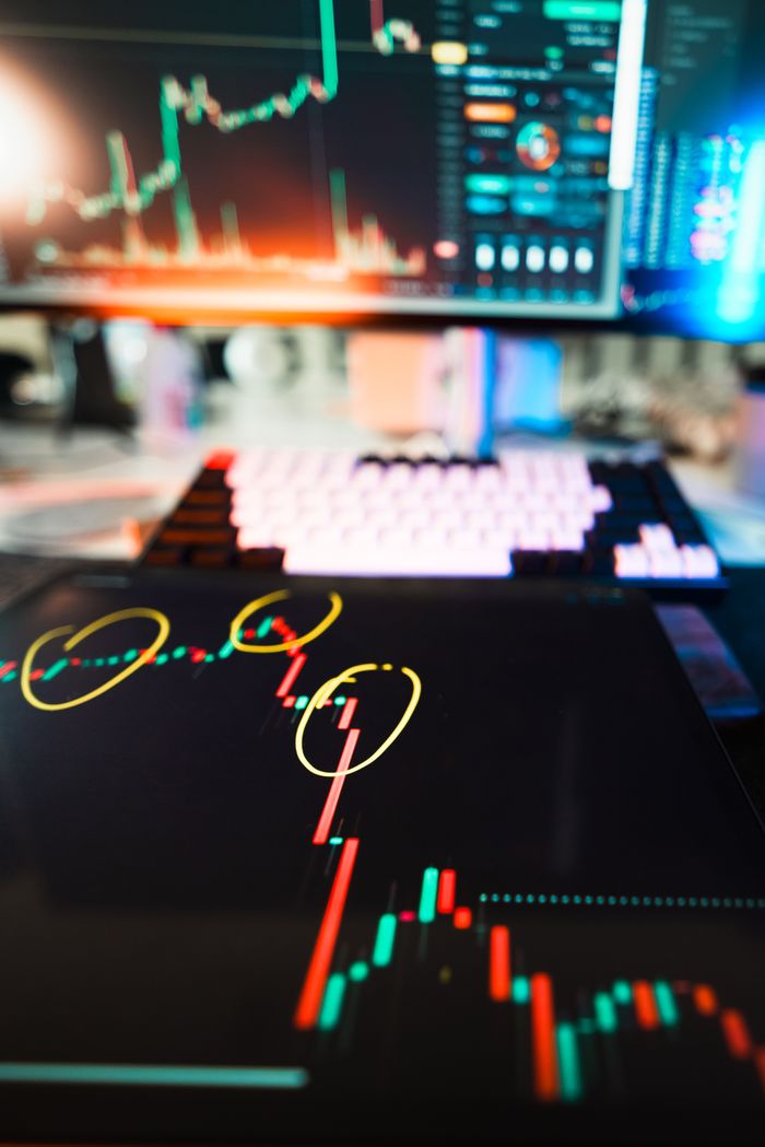 About Close-up of cryptocurrency market data visualization on screens with highlighted trends and charts.